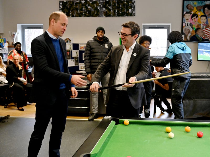 Andy Burnham hands over the cue as the pair enjoy a game of pool