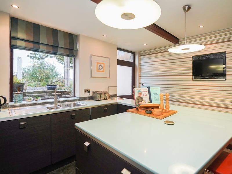 The property contains a "modern fitted breakfast kitchen" with a number of integrated appliances. (Photo courtesy of Redbrik)
