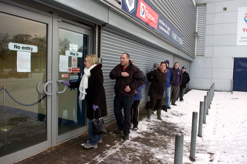 Preston North End fans wait for the ticket office to open so that they can get their hands on PNE v Chelsea FA Cup tickets in 2010.