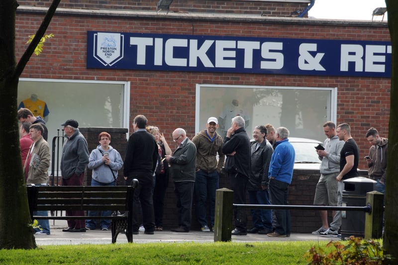 North End fans queue for 2014 League One play-off semi-final tickets for Rotherham's trip to Deepdale.