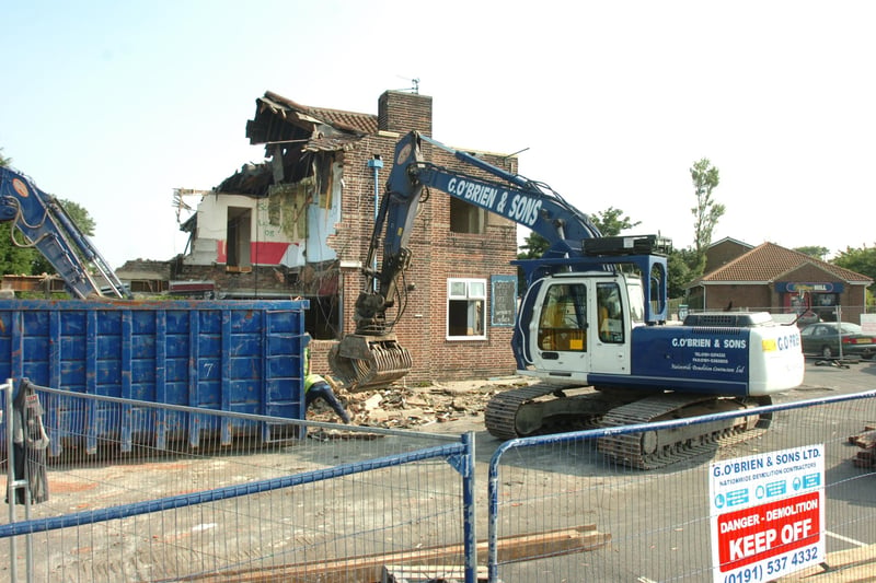Bulldozers pictured in a demolition scene from July 2008.