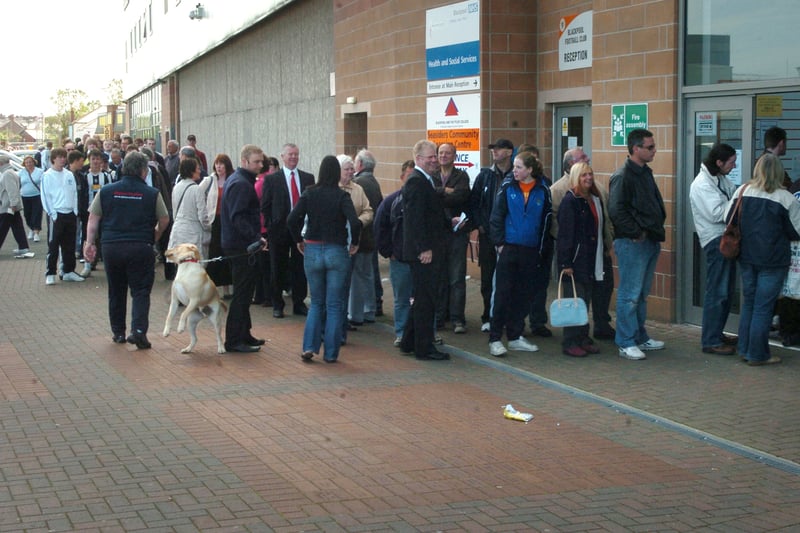 Fans queue to buy tickets at Bloomfield Road for Blackpool's 201- play-off final match against Cardiff at Wembley.