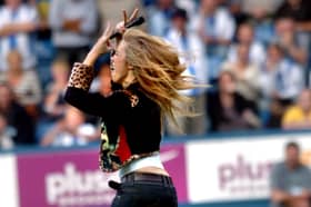 'Twin' performing on the pitch at Hillsborough at half-time making two fingured signs towards the Barnsley fans.