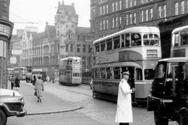 A view down the Trongate in the early 20th century. The first tram service in Glasgow began in 1872 with it being taken over by Glasgow Corporation in 1894. 