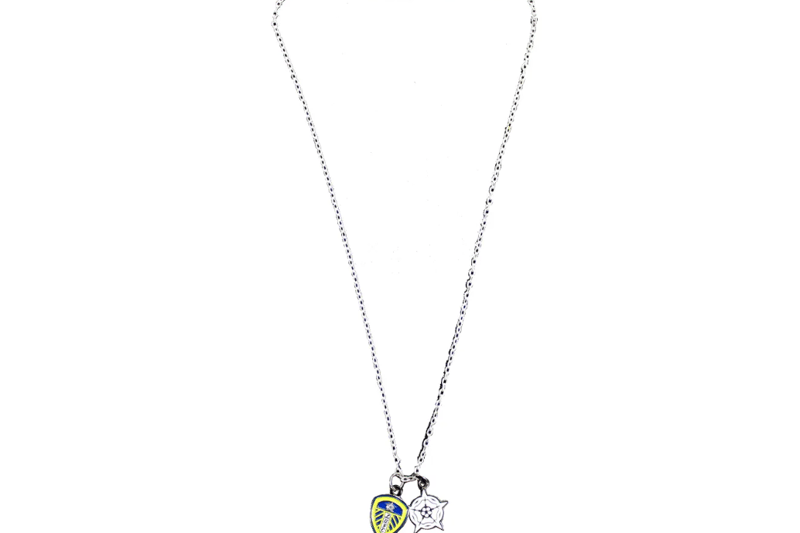 The Yorkshire Rose and club pendant feature on this necklace.
