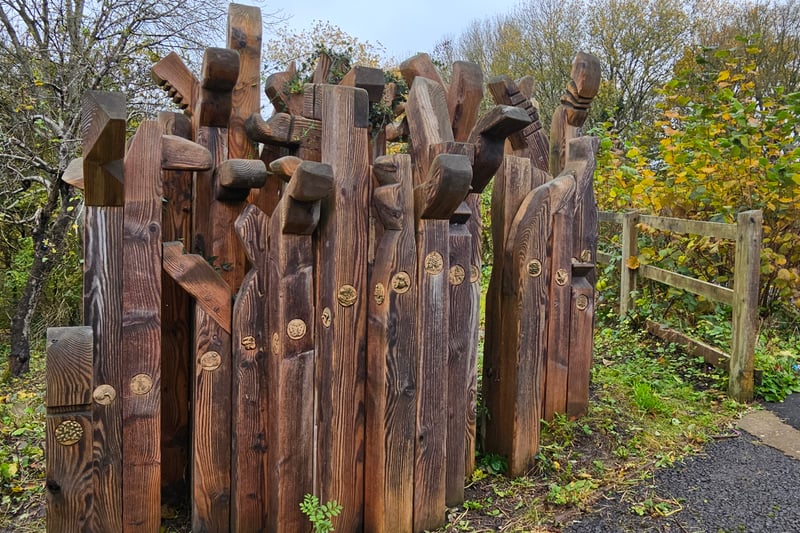 The wooden sculpture is located near Magpie Court and is marked on the map on the information board.
