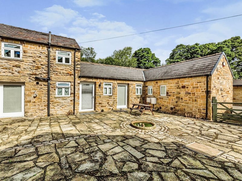 The property includes plenty of additional space outside the home. (Photo courtesy of Zoopla)