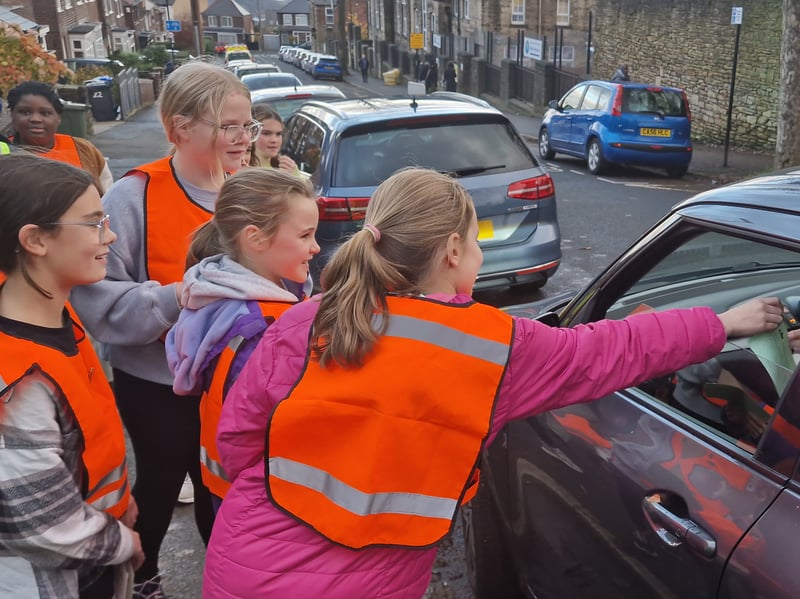 Youngsters on patrol outside Westways Primary school in the new Good / Bad Parking scheme, Picture: David Kessen, National World