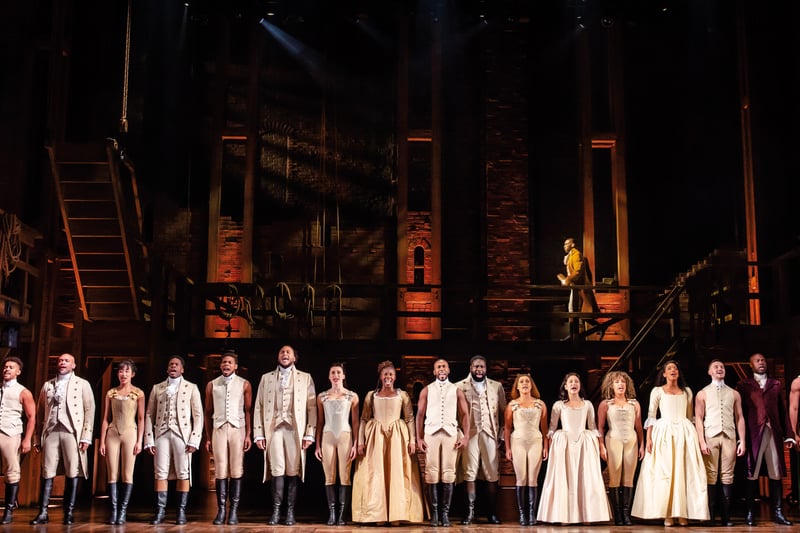 The Company of Hamilton on stage at The Palace Theatre/ Photo by Danny Kaan