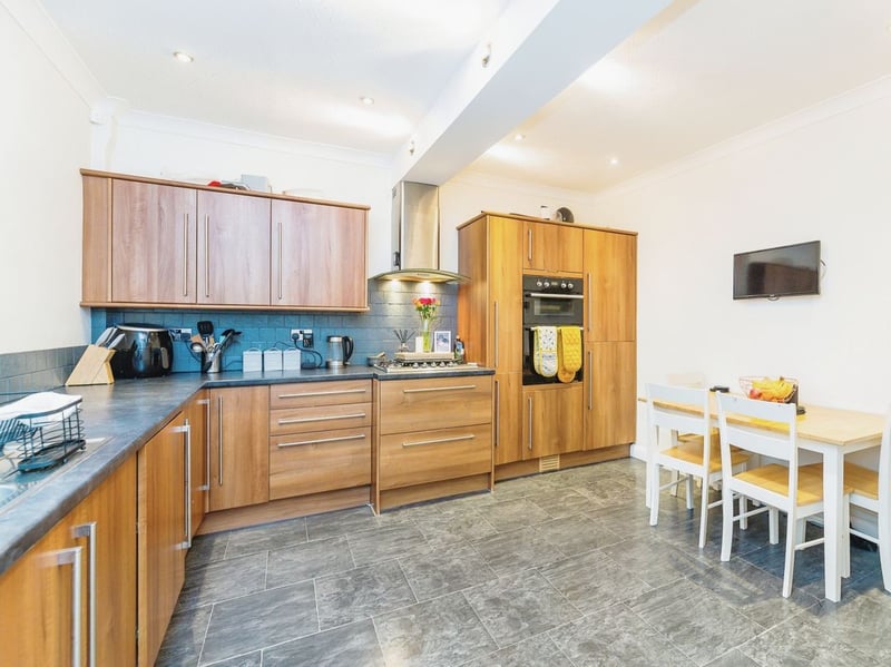 This large kitchen has loads of storage and plenty of space for a good-sized dining table. (Photo courtesy of Purplebricks)
