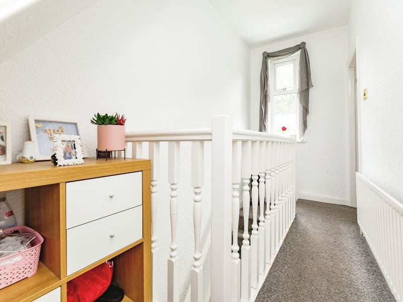 The first floor landing provides access to bedroom two, bedroom three and the bathroom. (Photo courtesy of Purplebricks)