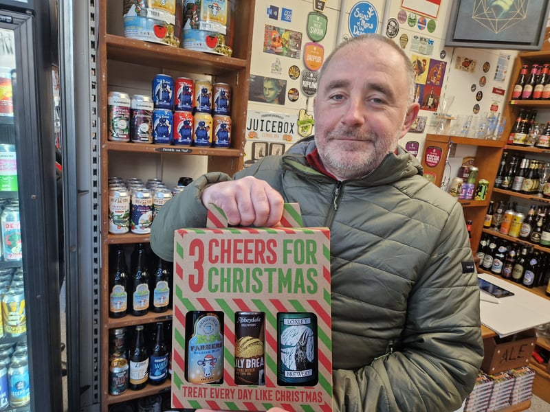 Sean Clarke, at Beer Central, recommended the Three Cheers for Christmas gift box, made of of beers brewed in Sheffield. Picture: David Kessen, National World