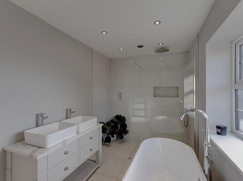 The modern master en-suite features a walk-in shower - an increasingly popular bathroom feature. (Photo courtesy of Blenheim Park Estates)