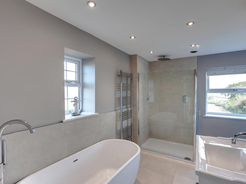 This shared en-suite bends around the corner separating the two bedrooms. (Photo courtesy of Blenheim Park Estates)