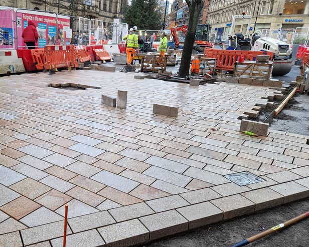 First paving on Fargate gives glimpse of the future on Sheffield's premier street.