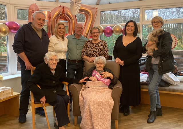Edith's 107th birthday party: Douglas Wright, Sally Weaver, Richard Elam, Linda Wright, Nicola Simpson, Nina Beverley, Margaret Elam, and Edith Laycock (Titman). 