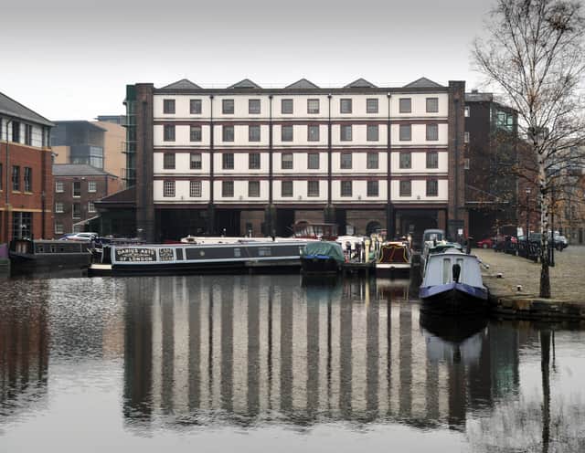 The Straddle building at Victoria Quays, Sheffield, following its conversion to offices. It is listed for auction, as are the canalside railway arches