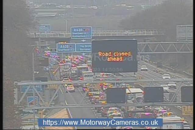 The M1 was closed in both directions near Sheffield, yesterday, after a man in a stolen car jumped out of the vehicle and ran onto the M1 to flee from police officers