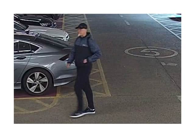 Another picture of one of the two men police believe may be able to assist with their enquiries 
