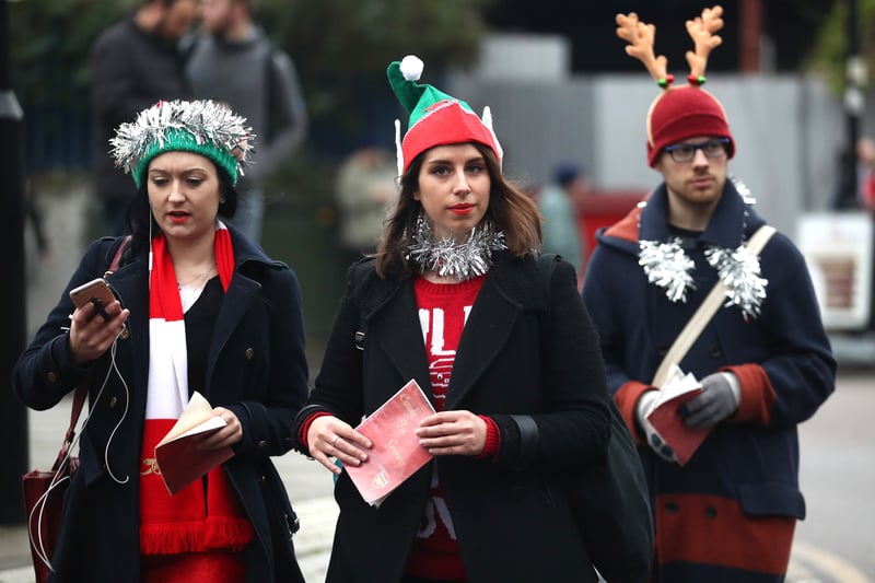 Arsenal fans in festive attire as they head to a home clash against Stoke. Theo Walcott, Mesut Ozil and Alex Iwobi all got on the scoresheet in a 3-1 win. (Getty Images)