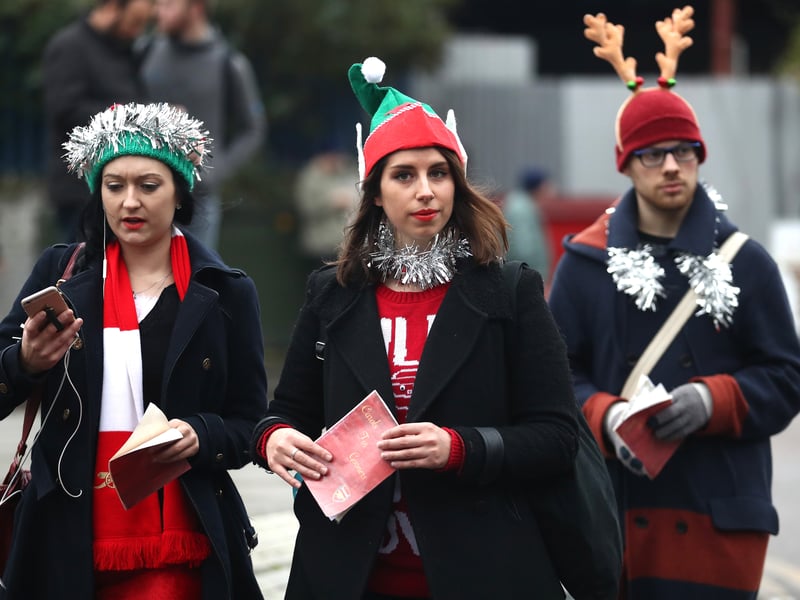 Arsenal fans in festive attire as they head to a home clash against Stoke. Theo Walcott, Mesut Ozil and Alex Iwobi all got on the scoresheet in a 3-1 win. (Getty Images)