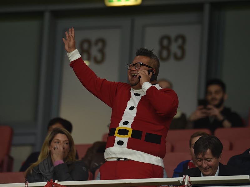 An Arsenal fan pictured in a Christmas jumper during a thrilling 3-3 draw with Liverpool. (Getty Images)