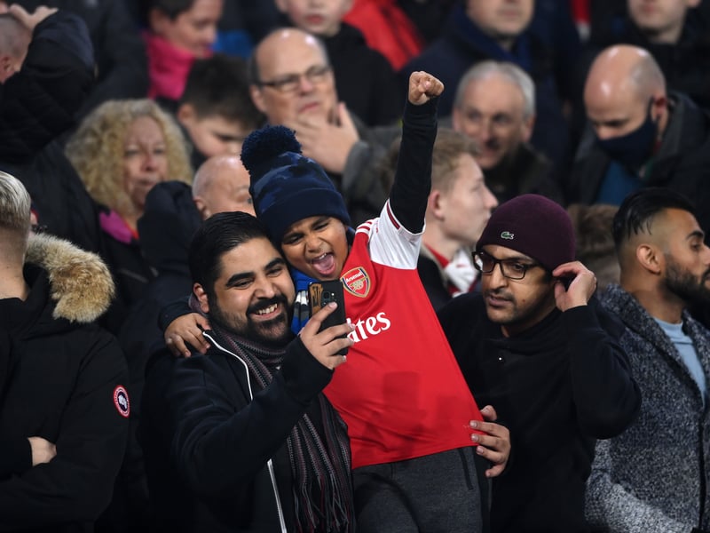 Arsenal fans take a selfie before a 4-1 away victory against Leeds. Youngsters Gabriel Martinelli, Emile Smith-Rowe and Bukayo Saka all scored as Mikel Arteta's side began to capture form. (Getty Images)