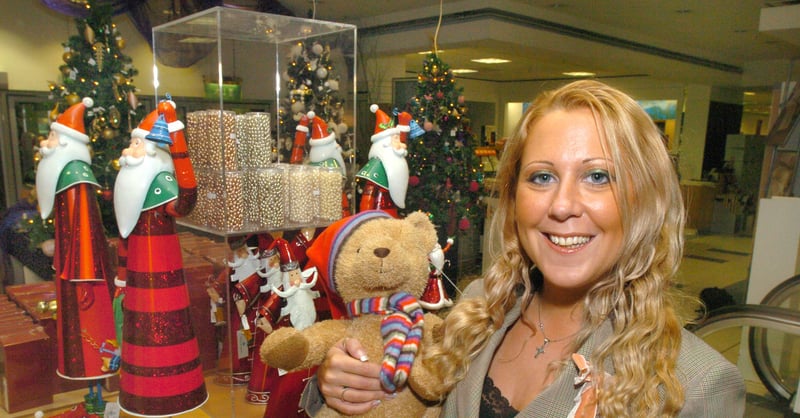 Jade Wilkinson at House of Fraser, Meadowhall, in 2005, with some of the gifts for sale that Christmas, including the  2005 Fraserbear,