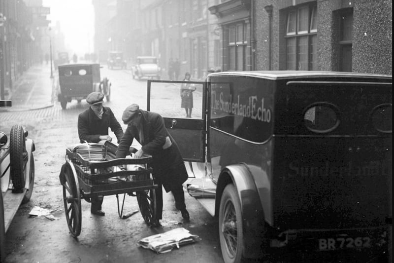 Loading the papers into the van for delivery in 1943.