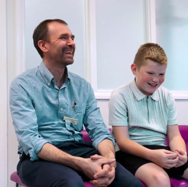 Evan with Dr Daniel Hawley, Consultant Paediatric Rheumatologist, who helps manage his treatment.