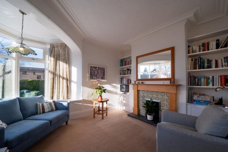 A second reception room boasts a stunning feature bay window providing lots of natural light. 