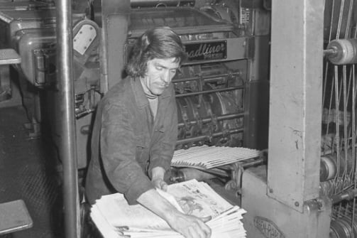 Press room assistant Tommy Ashbridge oversees the last run of the Bridge Street presses in 1976.