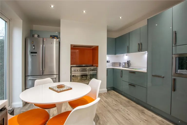 The modern fitted kitchen has a range of integrated appliances.