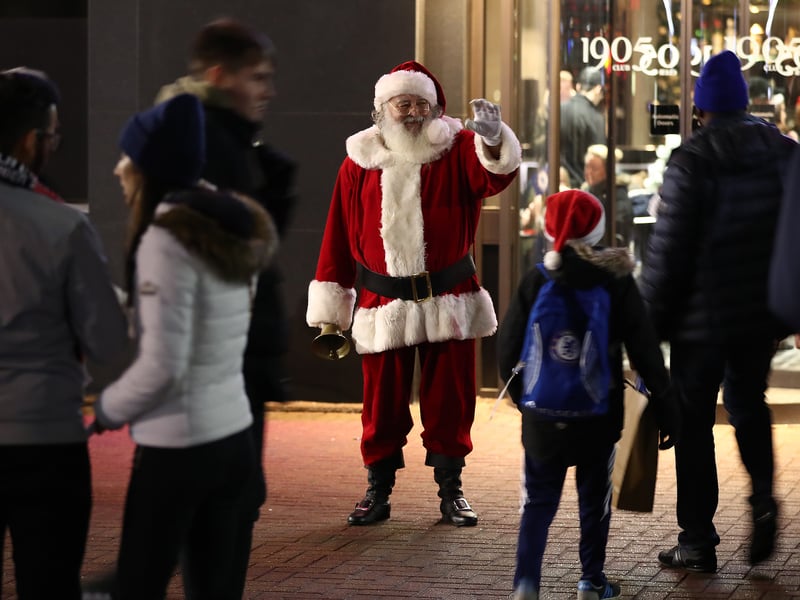 Father Christmas waves to Chelsea fans before kick-off