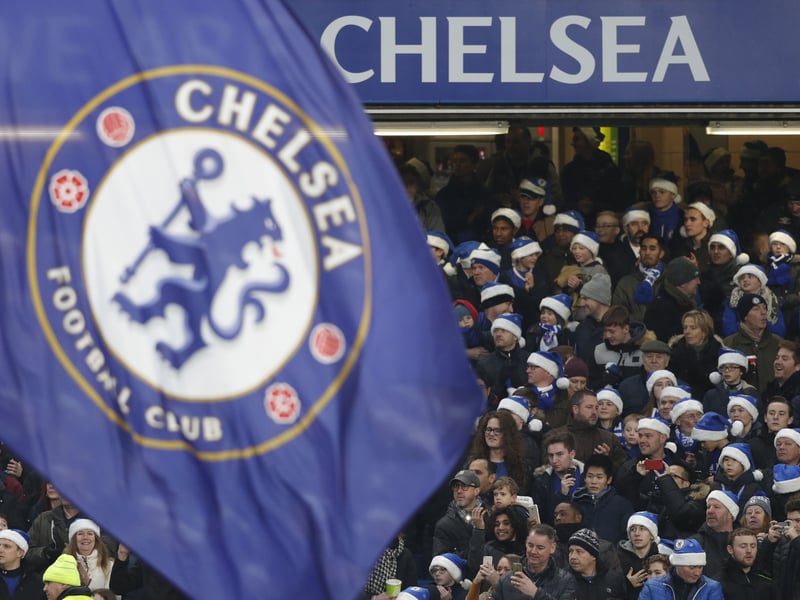 Chelsea fans wear blue santa hats