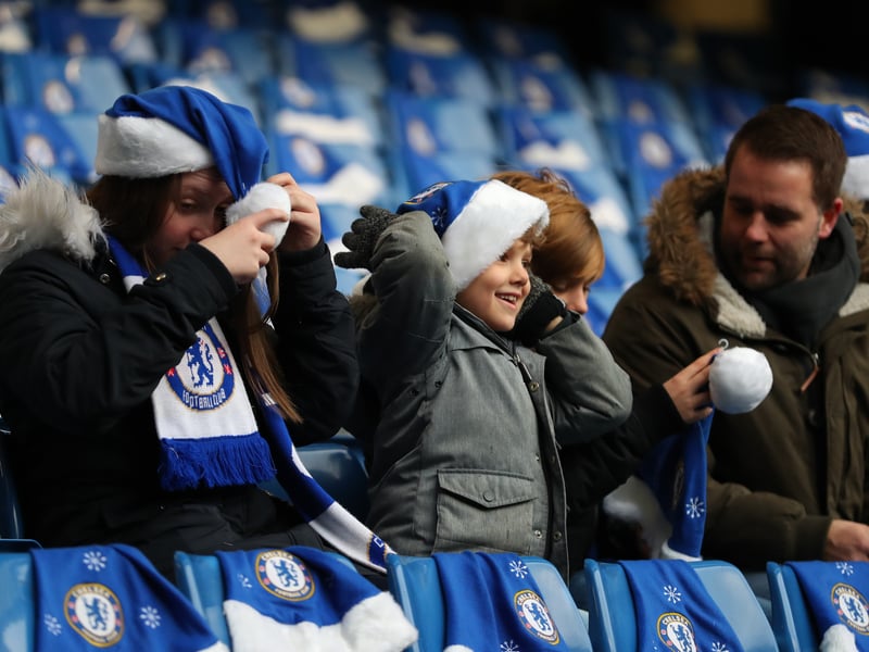 Chelsea fans put on their Christmas hats prior to the Premier League match between Chelsea and Southampton