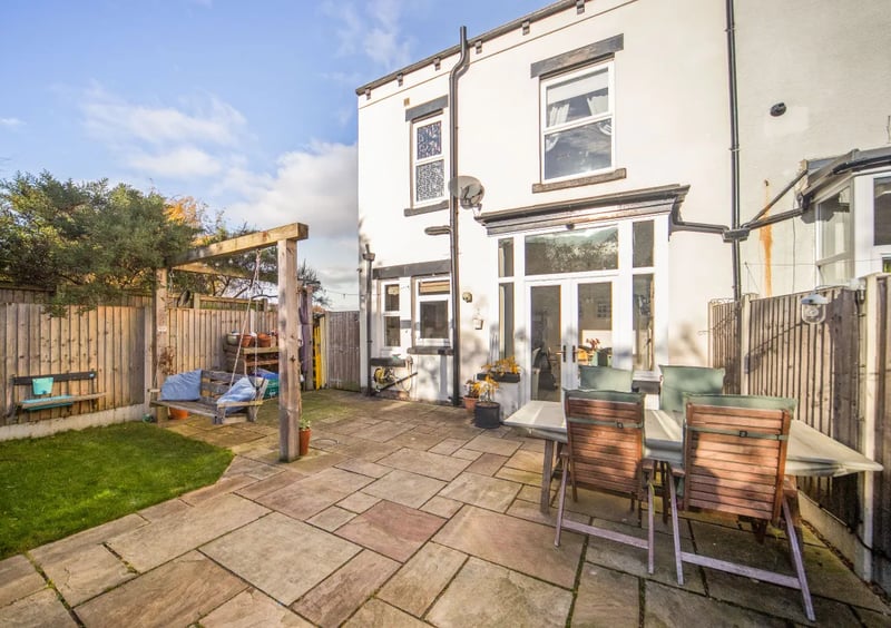 To the rear is this low maintenance enclosed garden which enjoys sun all day with large patio and lawn.
