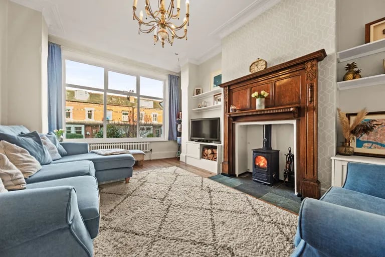 Here is a stunning feature fireplace with log burner.