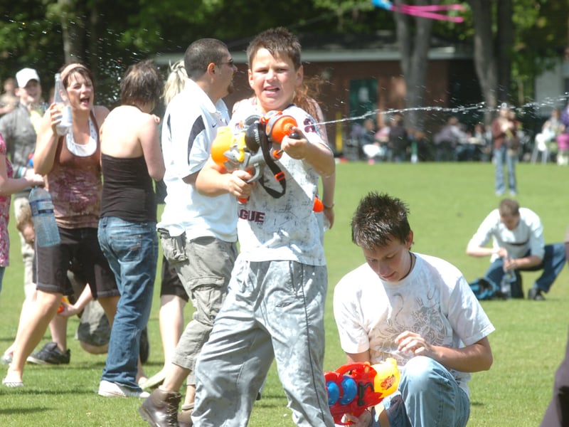 People take part in a water fight at Endcliffe Park, which had been arranged over the internet, in 2007