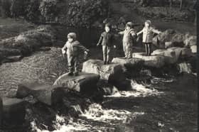 Youngsters on the stepping stones at Endcliffe Parl, Sheffield, on January 1, 1967