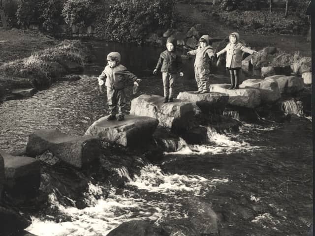 Youngsters on the stepping stones at Endcliffe Parl, Sheffield, on January 1, 1967