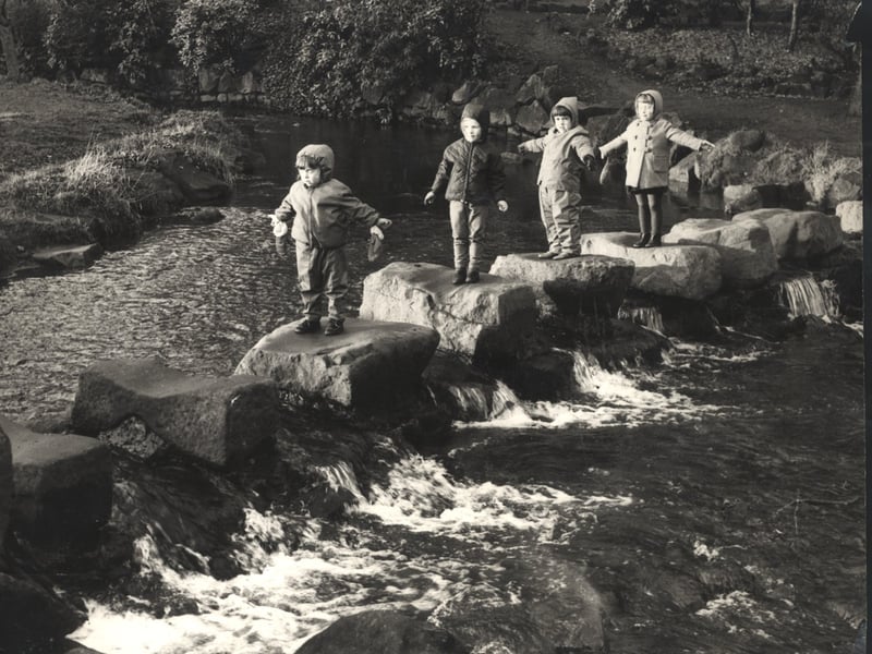 Youngsters on the stepping stones at Endcliffe Park, Sheffield, on January 1, 1967