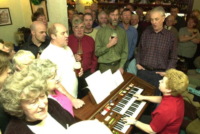 A packed Royal Hotel at Dungworth, singing carols on December 16 2001. Pic Barry Richardson.