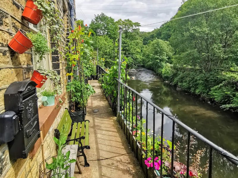 The host said: ""Our small riverside terraced cottage boasts an idyllic view across the River Calder and Rochdale canal and up onto the wooded valley sides. Built in 1860 for workers at the nearby cotton mill, this home has many period and original features. Whether you are cooking in the kitchen, relaxing in front of the wood burning stove, laying in bed or luxuriating in the gorgeous feature bath, there is a stunning view to be seen from every window. If you are lucky you may see an otter or mink swim by."