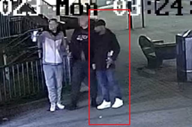 Police wanted to speak to the man highlighted in red after four men robbed a victim of his watch, jewellery, mobile phone, bank card and bus pass on Arundel Gate in Sheffield.