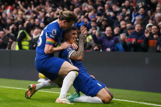  Enzo Fernandez of Chelsea celebrates with teammate Conor Gallagher after scoring the team's first goal during the Premier League match