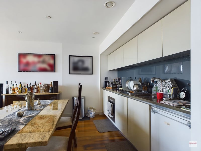 The kitchen has plenty of storage, an oven, large fridge and space for a dishwasher. (Photo courtesy of Zoopla)