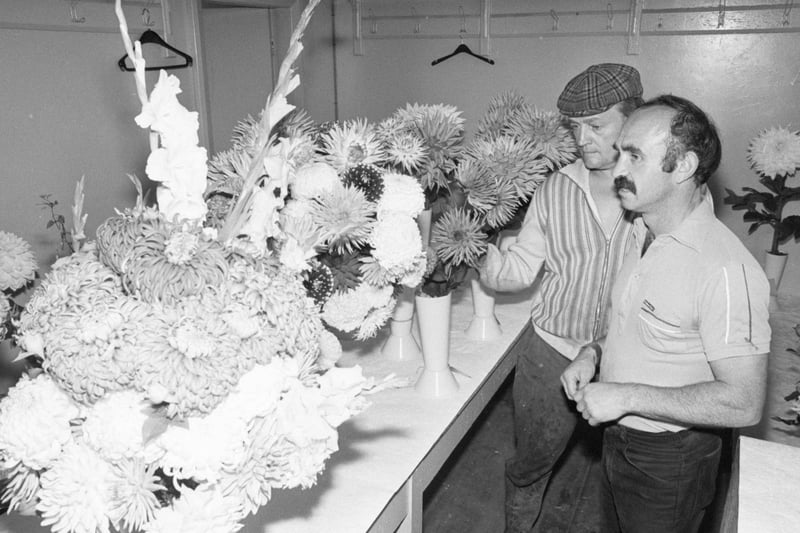 Wearmouth Colliery Welfare Garden Club's annual flower and vegetable show, in 1982.
Committee member George Richardson (left) and club secretary Colin Dobson examine the produce.
