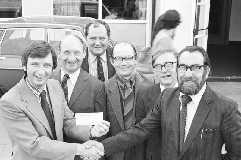 The colliery's generous workers thought of others.
In 1980, they raised money for an operating microscope at Sunderland Hospital.
Here is George Semens (right) chairman of the Wearmouth Colliery Mechanics' Association, presenting a cheque for £536 to Mr John Bowskill, Sector Administrator at Sunderland Dist Hospital.  