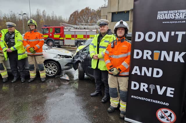 Police and firefighters at the launch of the campaign against drink driving over Christmas, at Parkway Fire Station, Sheffield. Picture: David Kessen, National World